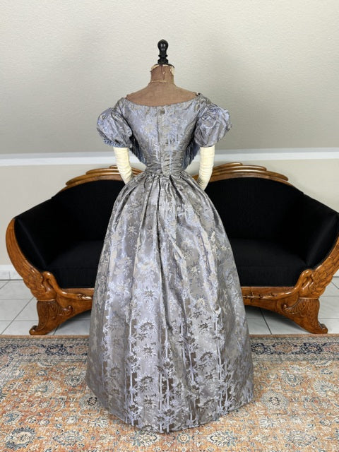 1845 Austrian Biedermeier evening dress in ivory silk with puffed sleeves and fitted bodice, antique gown