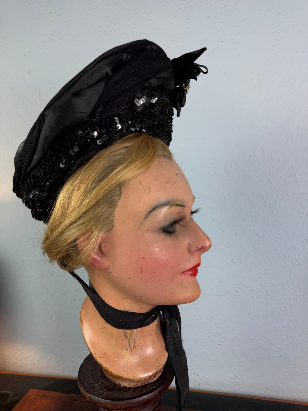 Victorian bonnet ca. 1880 with silk, sequins, fabric flowers, Paris label, chin bow, well preserved