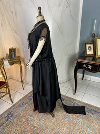 1918 black silk evening dress with sequins, cabochon stones and narrow train, antique transitional gown