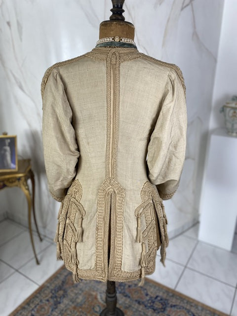 1910 Drecoll Paris–Vienna walking jacket in black wool with velvet collar and decorative buttons, antique garment