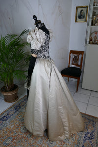 Antique silk dress 1890s — detailed view of sleeves, lace and fabric texture
