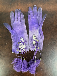 Victorian purple lace‑up gloves with pompoms, 1860s