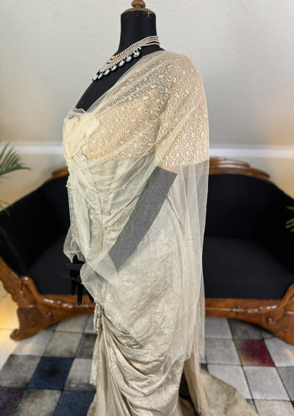1912 Titanic‑era antique evening dress in ivory silk with lace bodice, draped skirt and rhinestone details, antique gown