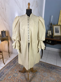 Antique fashion Edwardian coat — back view highlighting construction and wool fabric