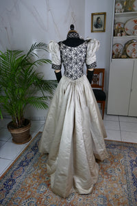 Antique silk dress 1890s — detailed view of sleeves, lace and fabric texture