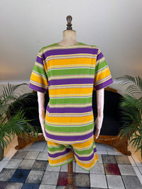 1920s bathing costume with short‑sleeved top and striped shorts