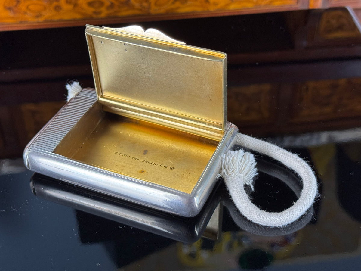 Silver cigarette case of Crown Prince Wilhelm of Prussia with crowned monogram, presentation pin and original caricature in bespoke casket.