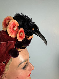 Autumn antique hat with exotic bird decoration, black lace and foliage, early 20th century