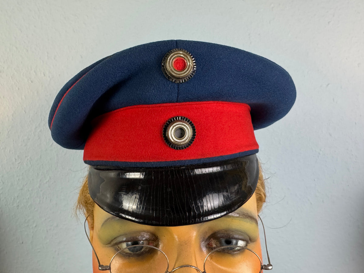 Rare Prussian officer’s dress cap by C. W. Borchert Berlin, red‑blue felt, gold crown