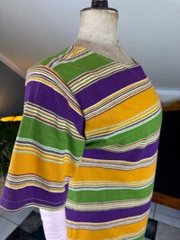1920s bathing costume with short‑sleeved top and striped shorts