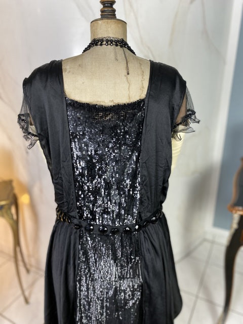 1918 black silk evening dress with sequins, cabochon stones and narrow train, antique transitional gown