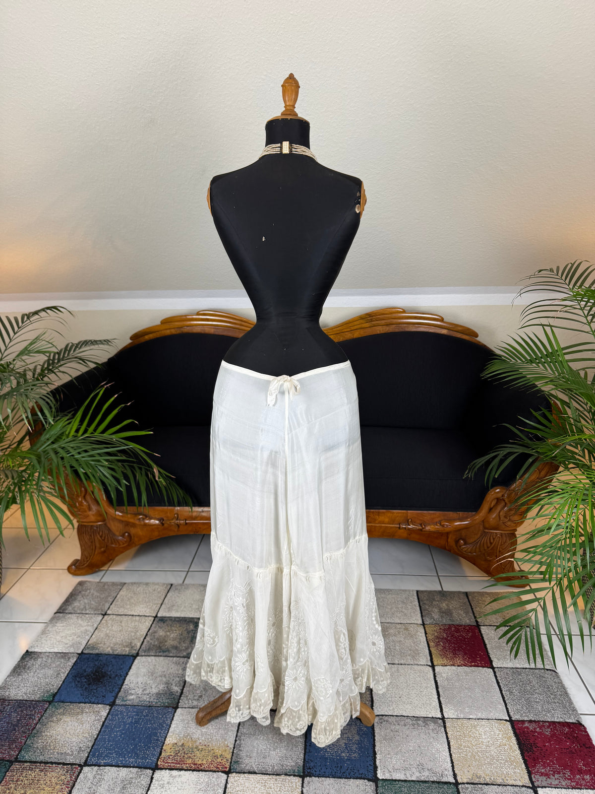 Antique Edwardian petticoat from Lady Gillman's 1911 bridal trousseau with silk waist, whitework embroidery, daisy motifs, and lace flounces