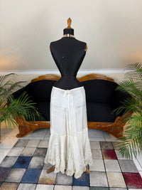 Antique Edwardian petticoat from Lady Gillman's 1911 bridal trousseau with silk waist, whitework embroidery, daisy motifs, and lace flounces