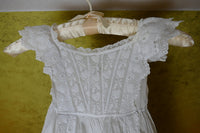 Edwardian christening gown ca. 1910 with white embroidery and pleated front