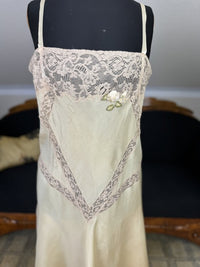 Marshall Field & Co. 1920s yellow silk chemise with ecru lace and rosette appliqué, antique lingerie.