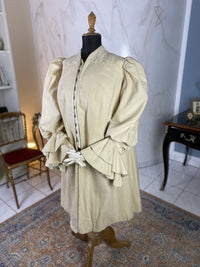 1906 Edwardian wool coat — shoulder area with passe‑partout trim