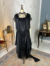 1918 black silk evening dress with sequins, cabochon stones and narrow train, antique transitional gown