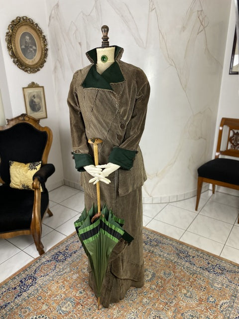 1912 striped Edwardian walking dress in cotton with high waistline, long skirt and decorative buttons, antique gown