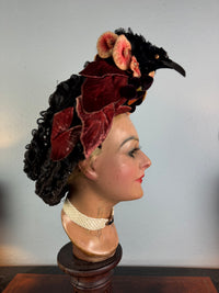 Autumn antique hat with exotic bird decoration, black lace and foliage, early 20th century