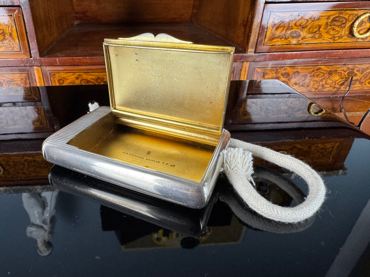 Silver cigarette case of Crown Prince Wilhelm of Prussia with crowned monogram, presentation pin and original caricature in bespoke casket.