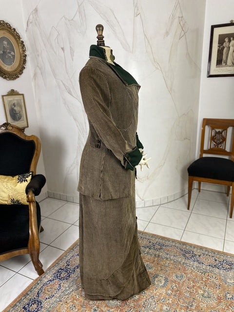 1912 striped Edwardian walking dress in cotton with high waistline, long skirt and decorative buttons, antique gown