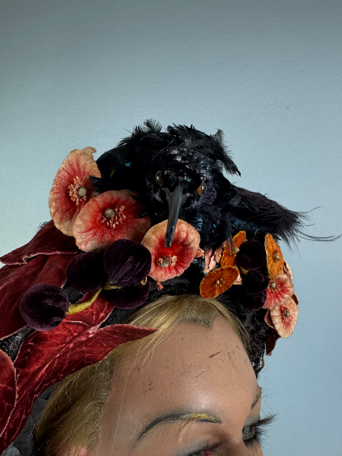 Autumn antique hat with exotic bird decoration, black lace and foliage, early 20th century