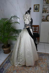 Antique silk dress 1890s — detailed view of sleeves, lace and fabric texture