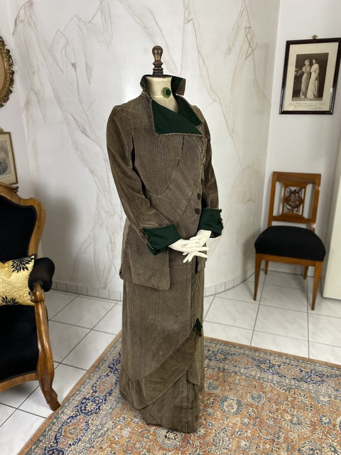 1912 striped Edwardian walking dress in cotton with high waistline, long skirt and decorative buttons, antique gown