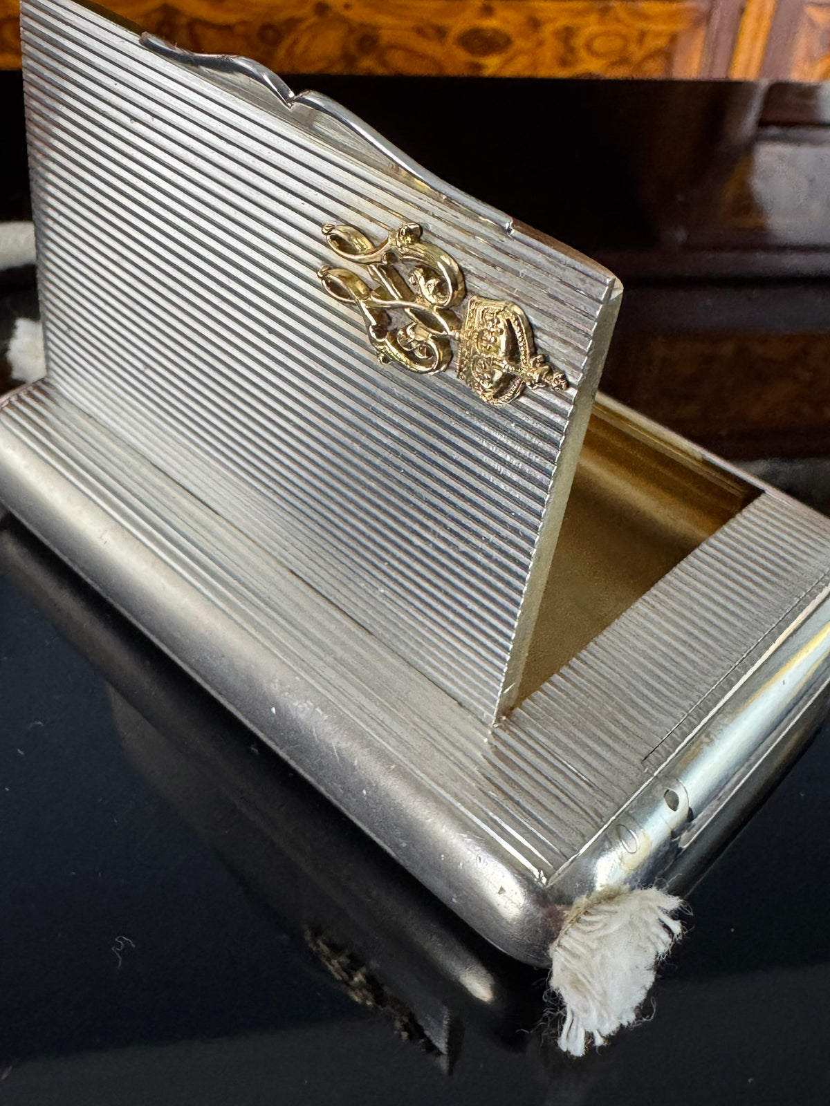 Silver cigarette case of Crown Prince Wilhelm of Prussia with crowned monogram, presentation pin and original caricature in bespoke casket.