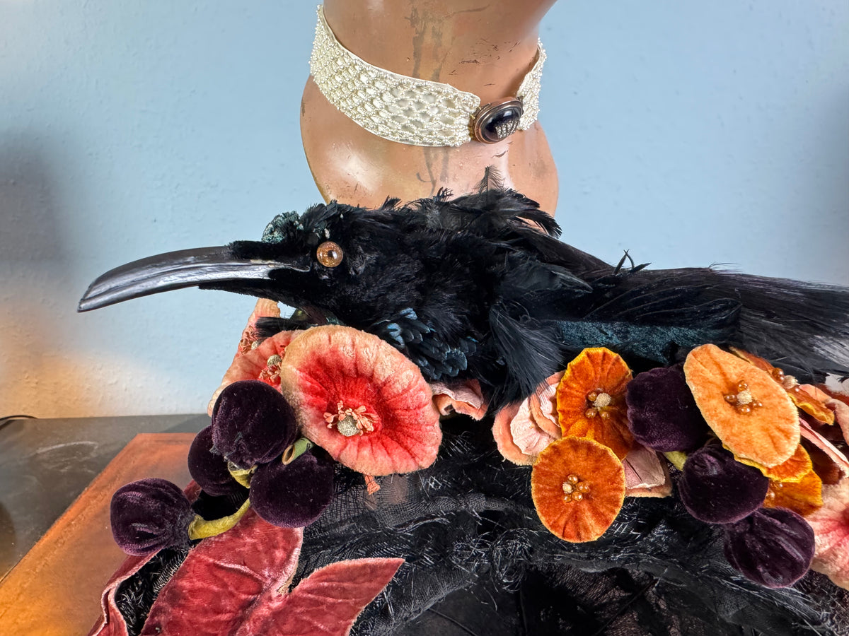 Early 20th‑century millinery hat with exotic bird mount, black lace and naturalistic trim