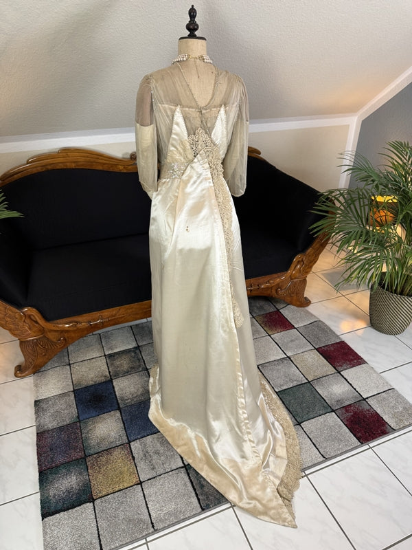 Early 20th‑century Almera Robes London dress with beaded belt, tulle sleeves and long lace train, antique couture gown