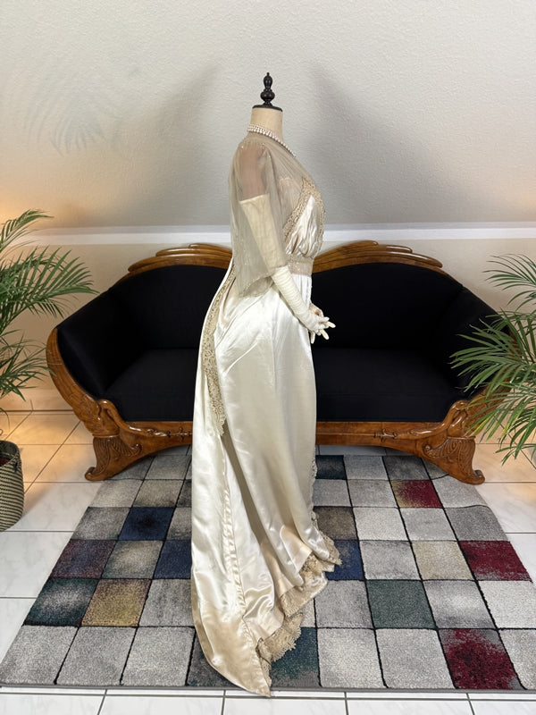 Early 20th‑century Almera Robes London dress with beaded belt, tulle sleeves and long lace train, antique couture gown