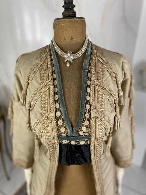 1910 Drecoll Paris–Vienna walking jacket in black wool with velvet collar and decorative buttons, antique garment
