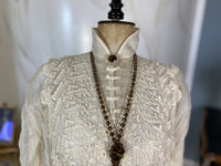 1911 Madame Agnes Unwin white cotton summer dress with lace inserts, high waistline and airy skirt, antique gown