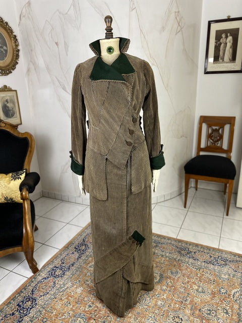 1912 striped Edwardian walking dress in cotton with high waistline, long skirt and decorative buttons, antique gown