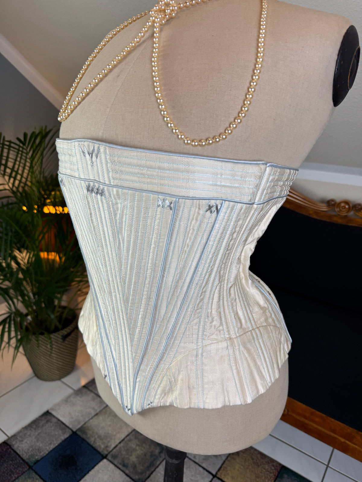 One‑piece vintage blue silk corset in 18th‑century style with hip gores and back lacing, English manufactory, excellent condition