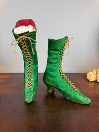 Victorian green silk lace‑up boots, c.1875, with brass fasteners, red leather lining and vivid aniline‑dyed colour