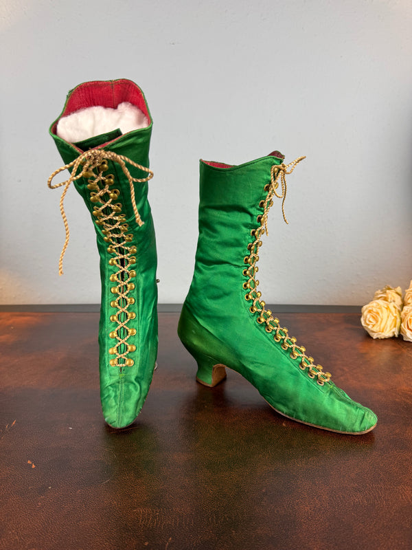 Victorian green silk lace‑up boots, c.1875, with brass fasteners, red leather lining and vivid aniline‑dyed colour