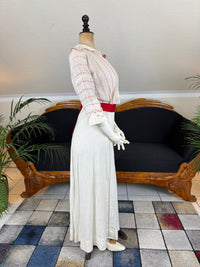 Natural Fiber Daywear Set — Linen skirt, red‑pattern cotton blouse with sailor collar, white leather shoes, red belt.
