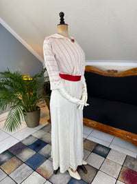 Natural Fiber Daywear Set — Linen skirt, red‑pattern cotton blouse with sailor collar, white leather shoes, red belt.