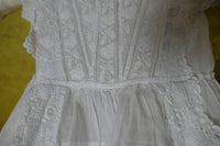 ntique white cotton christening dress with scalloped hem, Edwardian period