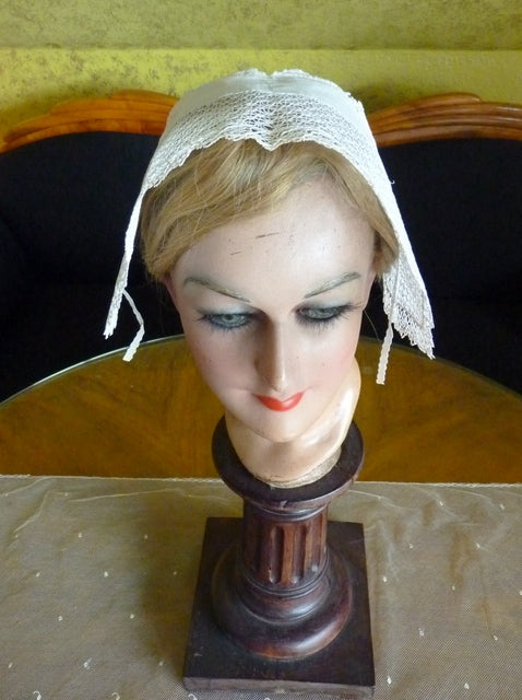 19th‑century Alsace lace bonnet with short chin ties
