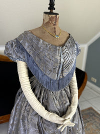 1845 Austrian Biedermeier evening dress in ivory silk with puffed sleeves and fitted bodice, antique gown
