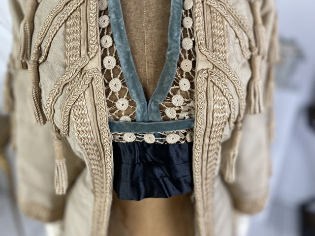 1910 Drecoll Paris–Vienna walking jacket in black wool with velvet collar and decorative buttons, antique garment