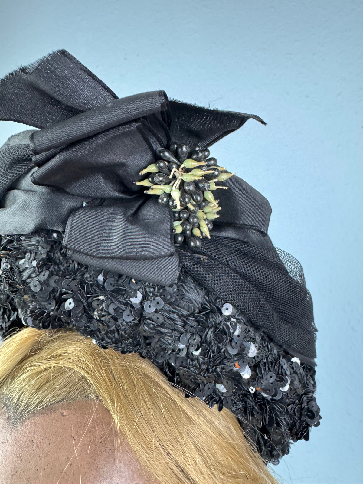 Victorian bonnet ca. 1880 with silk, sequins, fabric flowers, Paris label, chin bow, well preserved