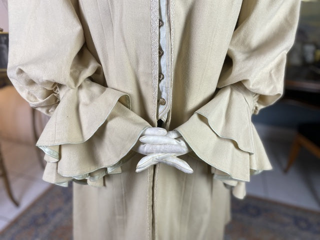 1906 Edwardian wool coat — shoulder area with passe‑partout trim