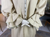 1906 Edwardian wool coat — shoulder area with passe‑partout trim