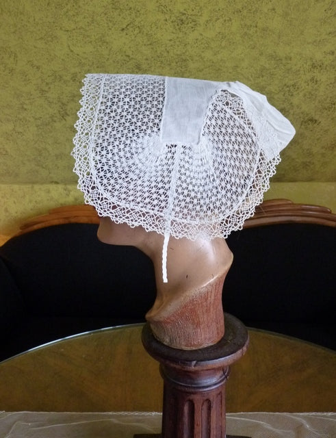 19th‑century Alsace lace bonnet with short chin ties