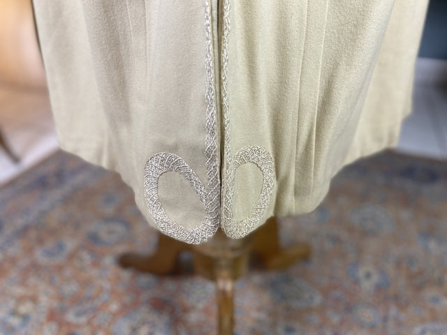 Antique fashion Edwardian coat — back view highlighting construction and wool fabric
