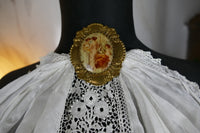 Jabot, um 1910